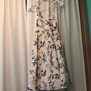 Short yellow dress with blue flowers